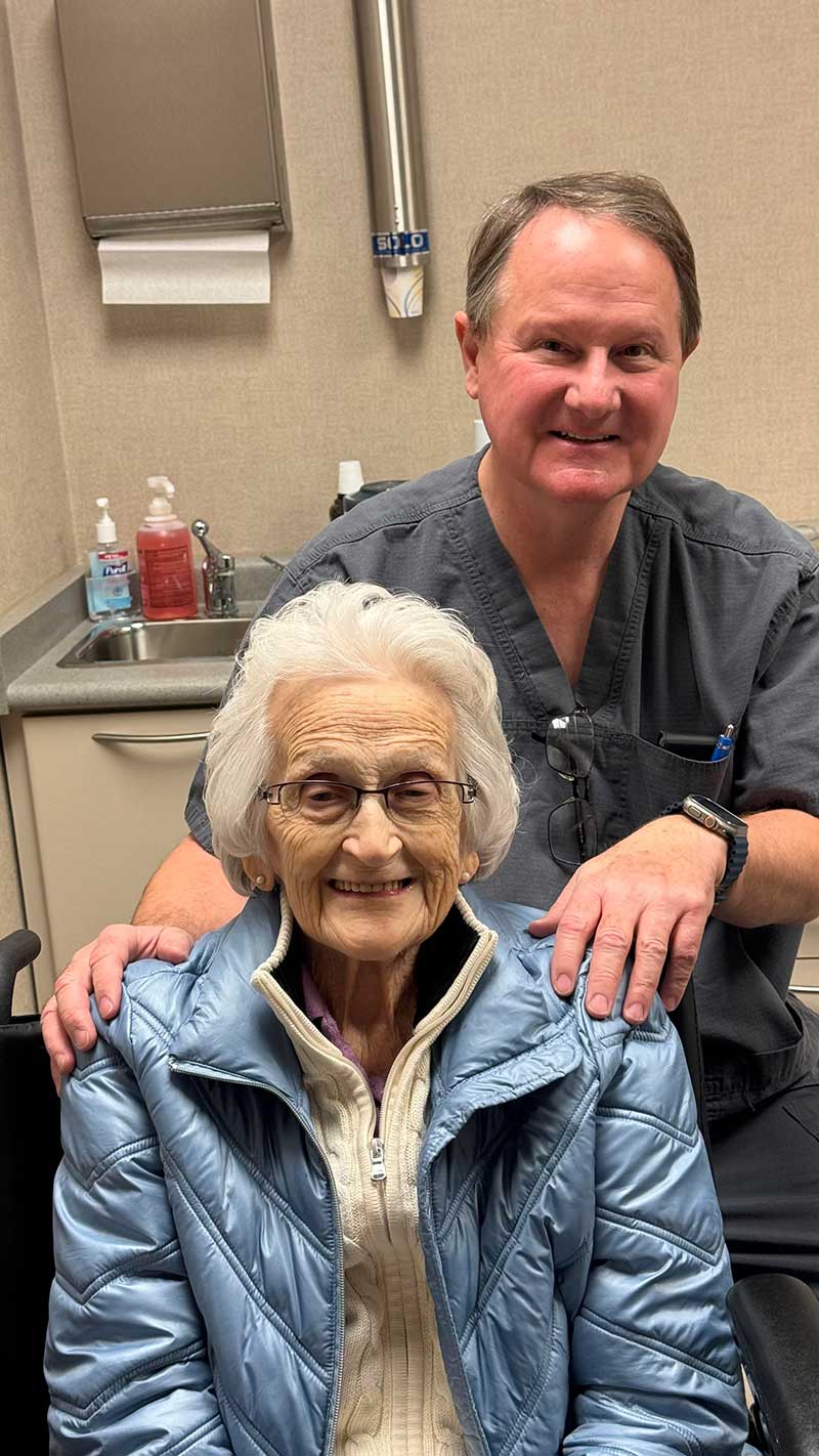 100 club member - woman with dr. miller